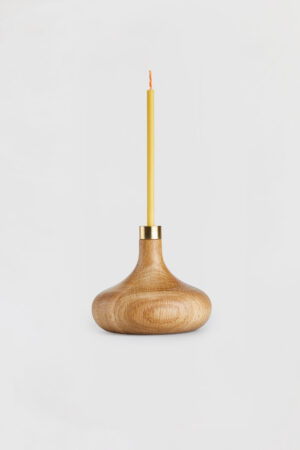 OVO Things Oak candle holder with a birthday candle